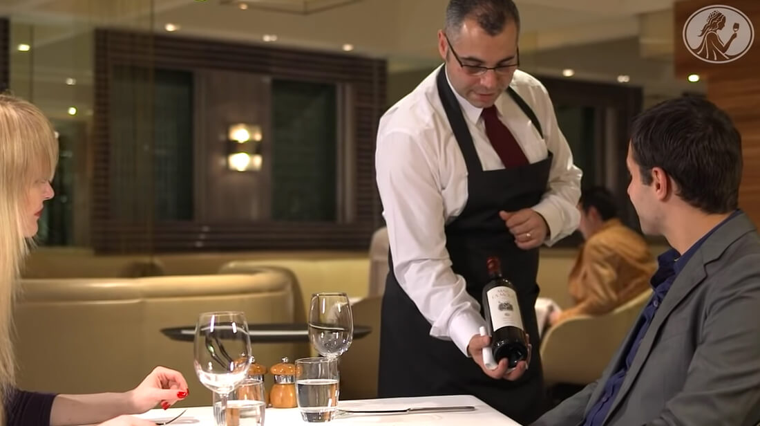 How to serve a bottle of red wine in a restaurant